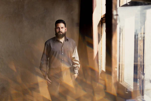 Young Man Beard Suit Standing Window — Stock fotografie