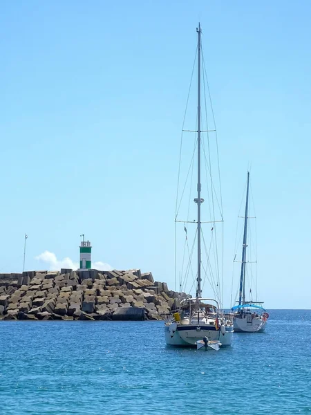 Yachts Bay Embankment Lighthouse Sunny Day — стоковое фото