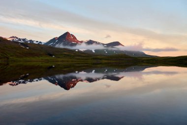 Mountains and lake early in morning