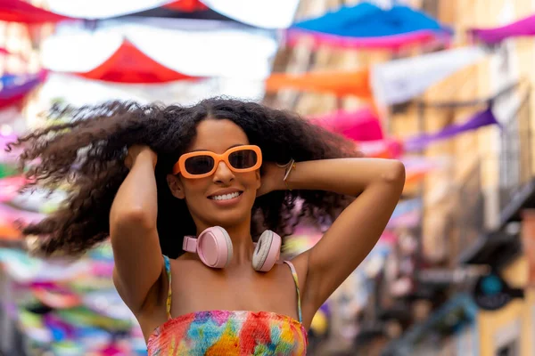 Happy Smiling Girl Touching Her Afro Hair —  Fotos de Stock