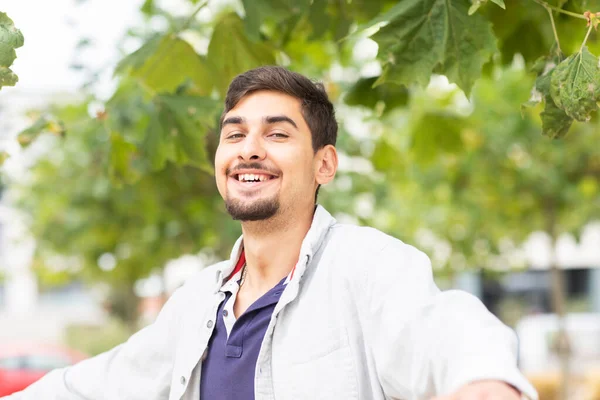 Young Man Stretching Arms Front Trees City — Stock Photo, Image