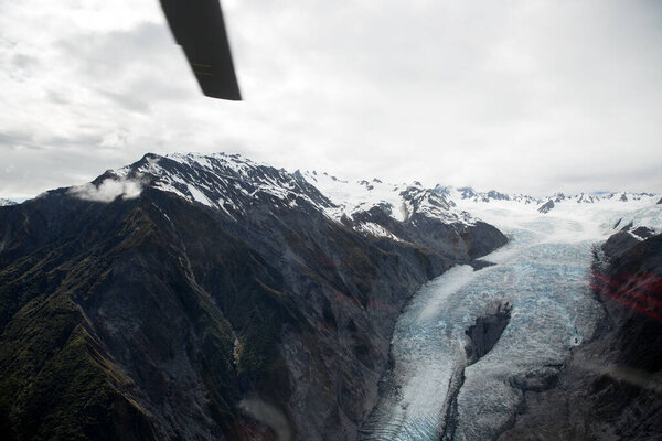 Fox Glacier view in New Zealand from a helicopter window
