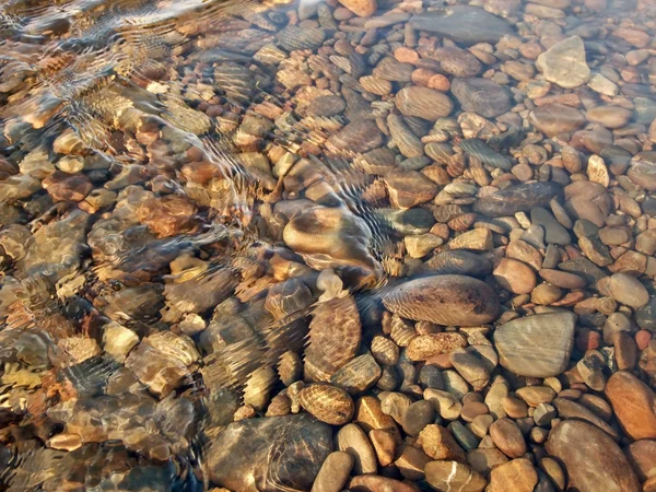 Piedras bajo el agua — Foto de Stock