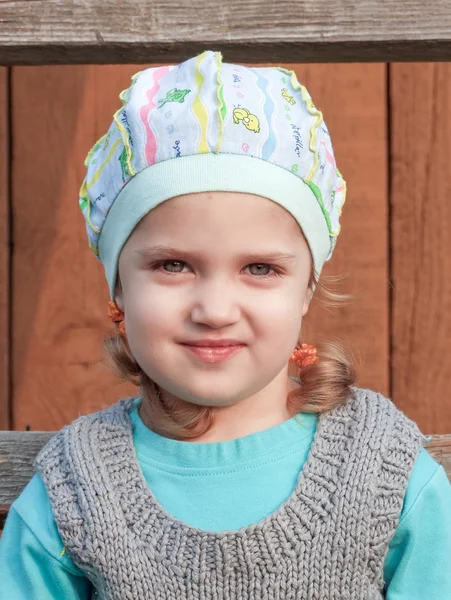 A pretty little girl outdoors. — Stock Photo, Image