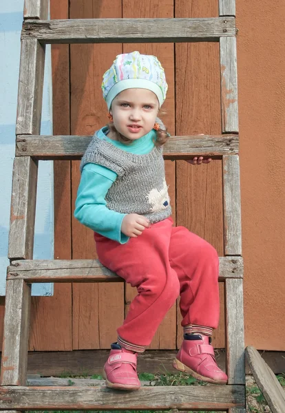 A pretty little girl outdoors. — Stock Photo, Image