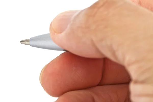 Mão segurando uma caneta. — Fotografia de Stock