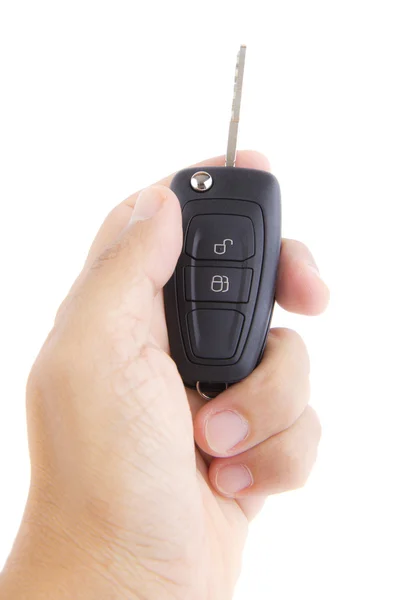 Hand holding a car key. — Stock Photo, Image