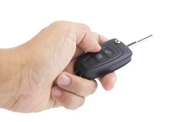 Hand holding a car key. — Stock Photo, Image