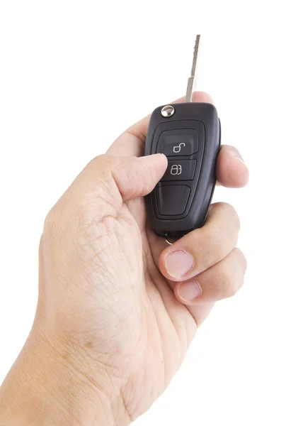 Hand holding a car key. — Stock Photo, Image