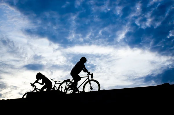 Silhouette of tow biker — Stock Photo, Image