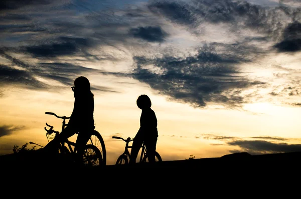 Silhouette of tow biker — Stock Photo, Image