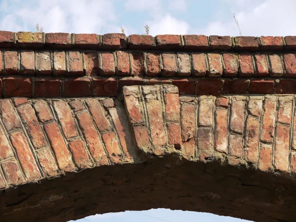 Bricklaying of an arch of one of old houses in Saratov