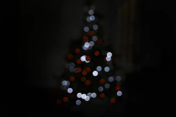 Christmas lights on tree, out of focus — Stock Photo, Image