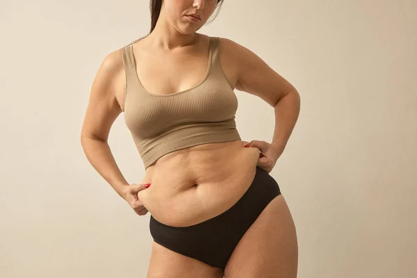 Unrecognizable Woman Pinch Abdomen Side Fat Body Shaming Problem Normalize ロイヤリティフリーのストック写真