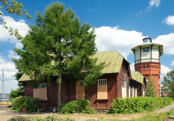 Water tower and house for the staff — Stock Photo, Image