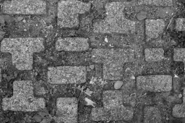 Evocative Black White Image Tetris Shaped Floor Brick Texture — Stock Photo, Image