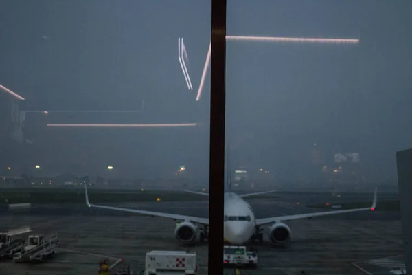 Evocative Image Reflection Neon Lights Airport Window — Stockfoto