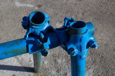 evocative image of a blue scaffolding connection joint
