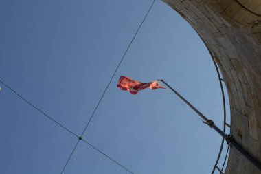 2022.07.15 Italy, Pisa, leaning tower of Pisaevocative image of the flag of the city placed on top of it