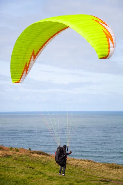 Paragliding blast-off — Stock Photo, Image