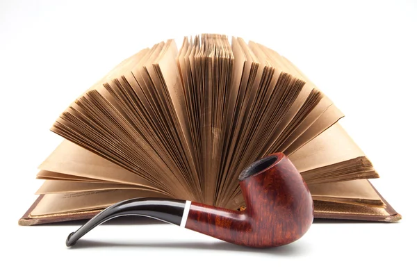 Pipe and ancient book — Stock Photo, Image