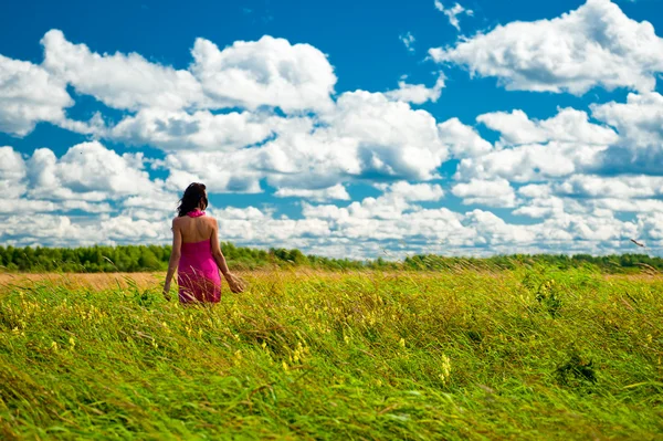 Beautiful girl against the sky Stock Photo