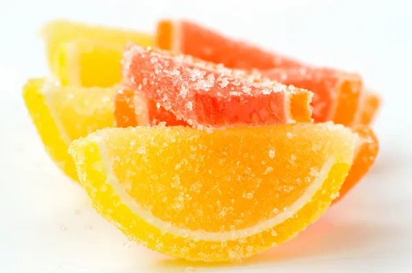 Colored marmalade (slices) on a white background Stock Image