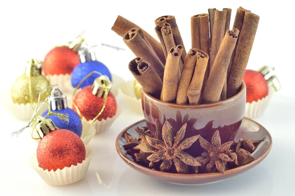 Cinnamon, star anise, Christmas ball — Stock Photo, Image