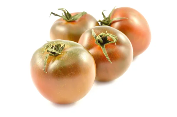 Kumato tomatoes — Stock Photo, Image