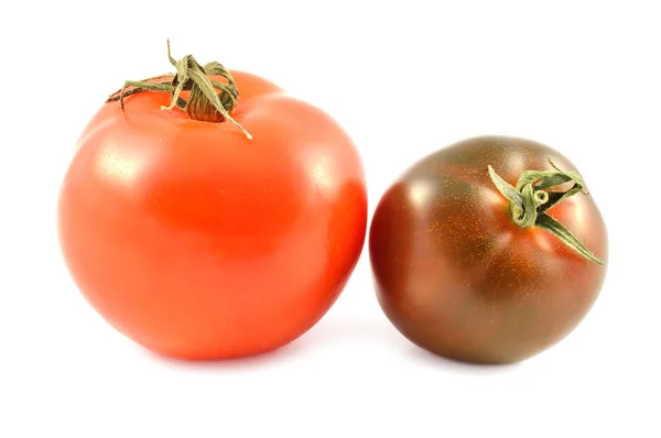 Tomate Kumato e tomate vermelho — Fotografia de Stock