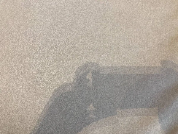 Shadow Man Hands Holding Smart Mobile Phone Light Gray Wall — Fotografia de Stock