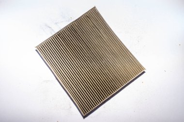 the cabin filter of the car cleaned the air for the driver and passengers and began to pass air poorly and the windows began to fog up, selective focus