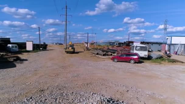 Yellow Backhoe Loader Moves Camera Excavator Transports Sand Bucket Builders — Stockvideo