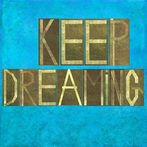 Earthy background image and design element depicting the words "Keep dreaming" — Stock Photo, Image