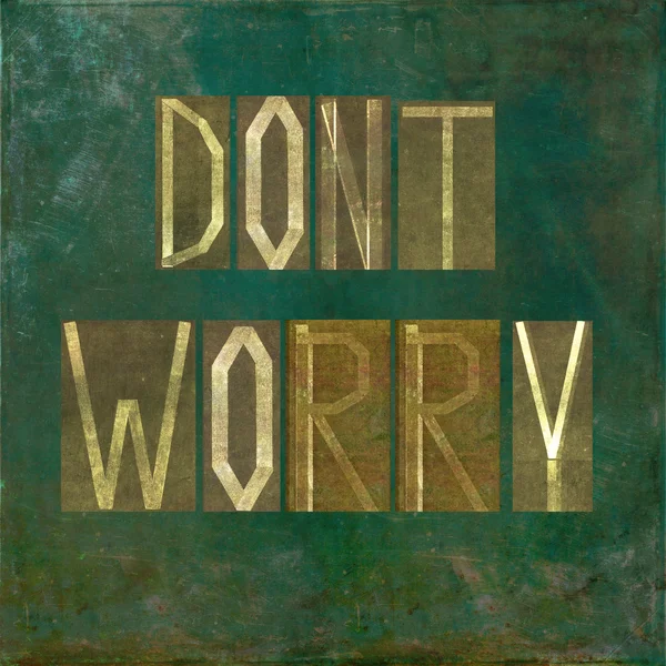 Jordnära bakgrund och designelement föreställande orden "oroa dig inte" — Stockfoto