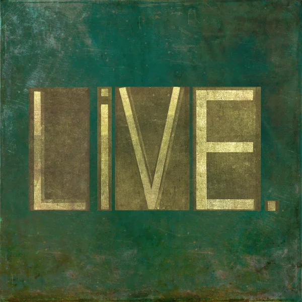 Földes háttér kép és a design elem ábrázoló a word "live" — Stock Fotó