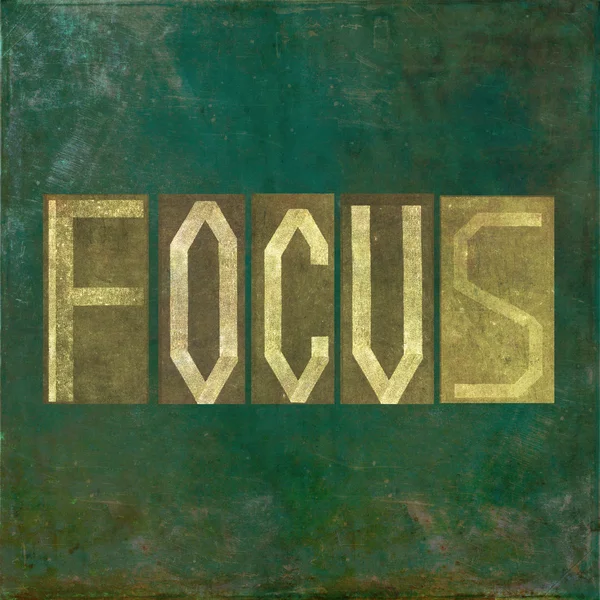 Earthy background image and design element depicting the word "Focus" — Stock Photo, Image