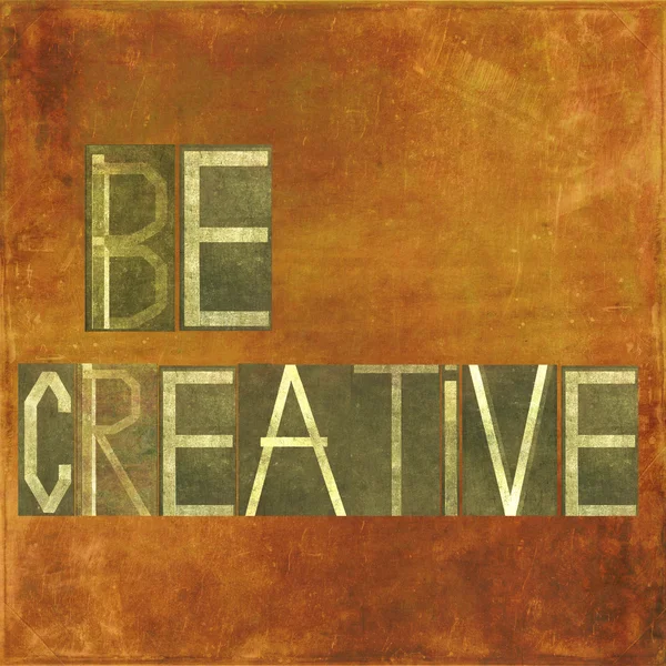 Zemité pozadí a konstrukční prvek zobrazující se slova "být kreativní" — Stock fotografie
