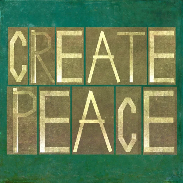 Earthy background and design element depicting the words "create peace" — Stock Photo, Image