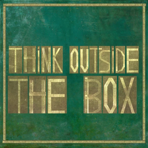 Earthy background and design element depicting the words "think outside the box" — Stock Photo, Image