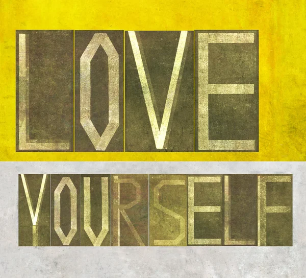 Slova "milovat sami sebe" — Stock fotografie