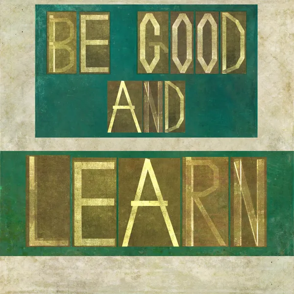 Slova "buď hodný a učit se" — Stock fotografie