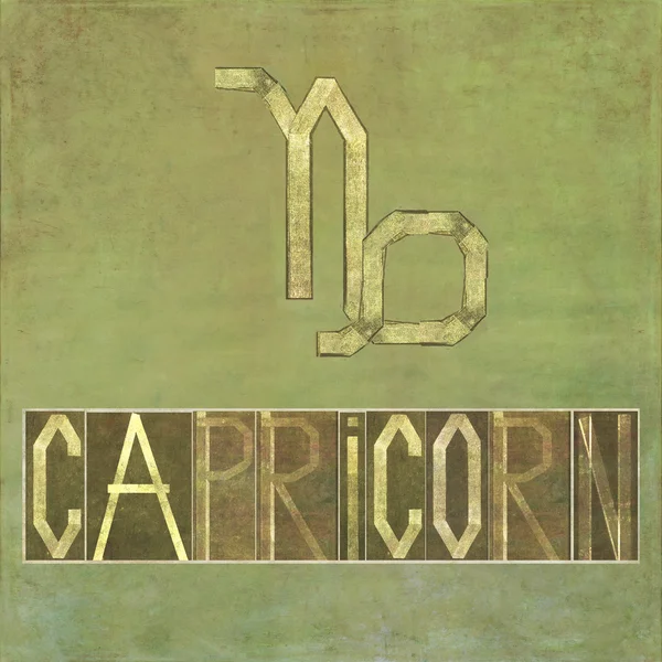 Word and symbol for the zodiac sign "Capricorn" — Stock Photo, Image