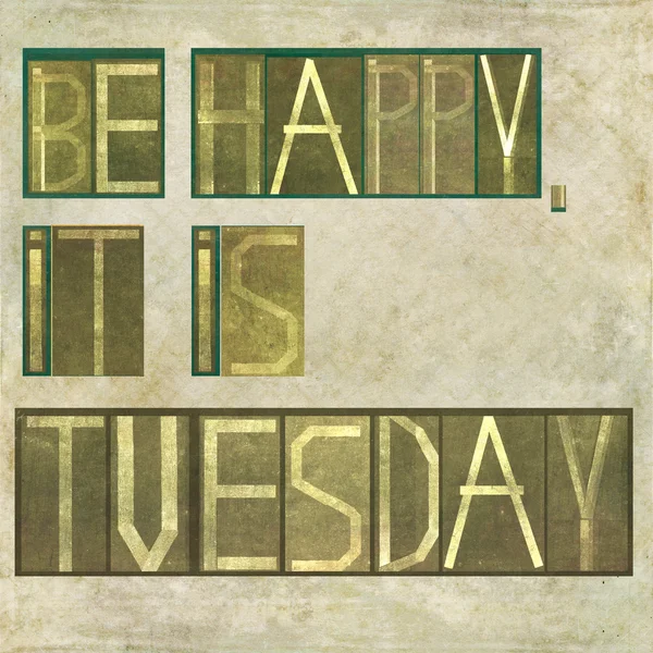 Design element depicting the words "Be happy, it is tuesday" Stock Picture