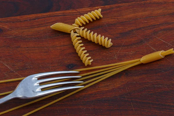 Tenedor Espaguetis Sobre Mesa Madera —  Fotos de Stock