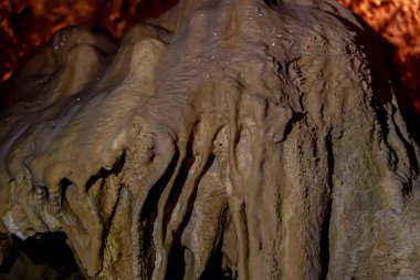 a geological formation by mineral deposits in natural caves in Italy
