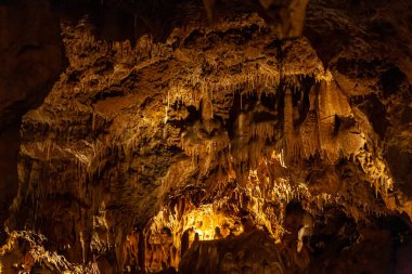 a geological formation by mineral deposits in natural caves in Italy