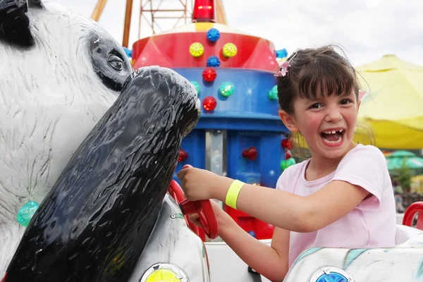 Fun on the carousel — Stock Photo, Image