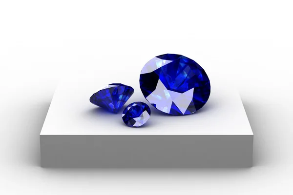 Blue sapphire on white podium — Stock Photo, Image