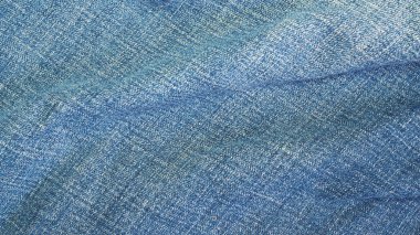 Mavi kot pantolon kumaş arka plan dokusu. Görüntüyü kapat.